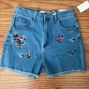 Flying Angel Embroidered High-Rise Denim Shorts in Blue